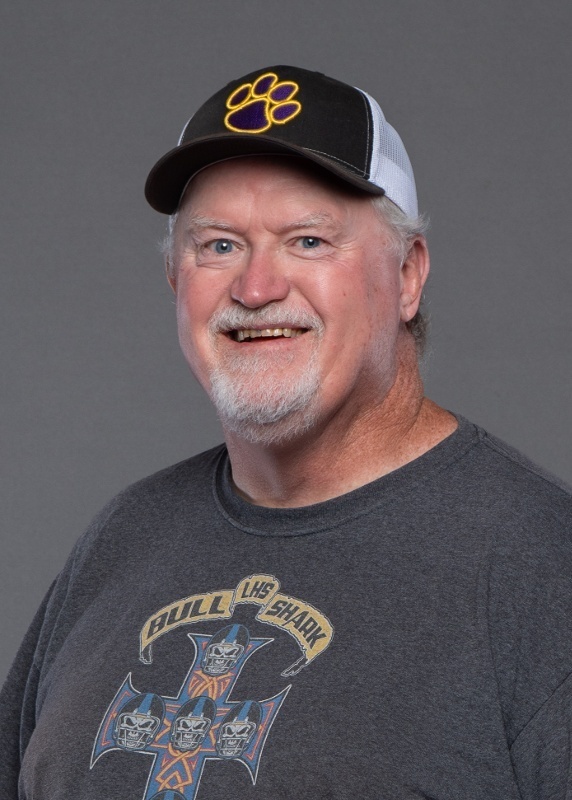 Emmett is in a grey tee shirt and LHS ball cap. He has grey facial hair