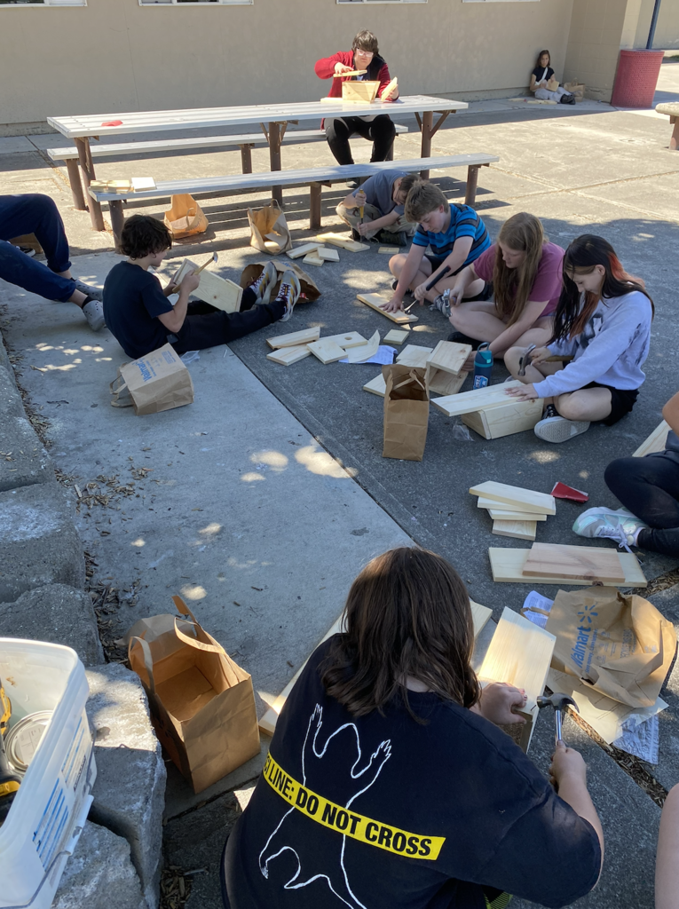 students building birdhouses