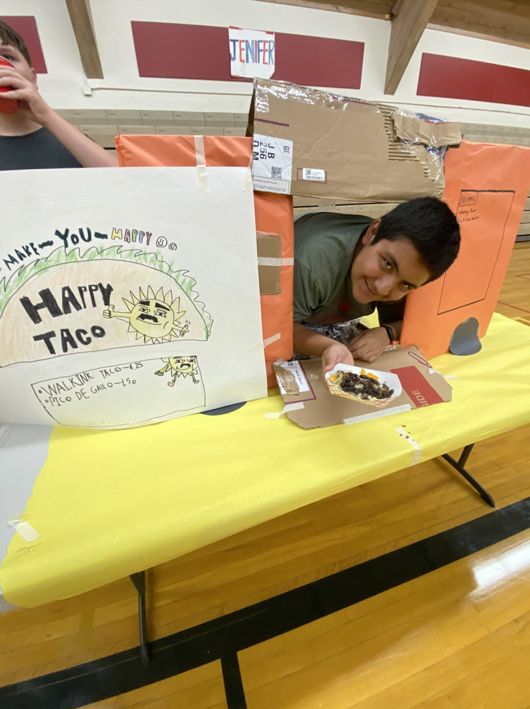 students with their food truck projects