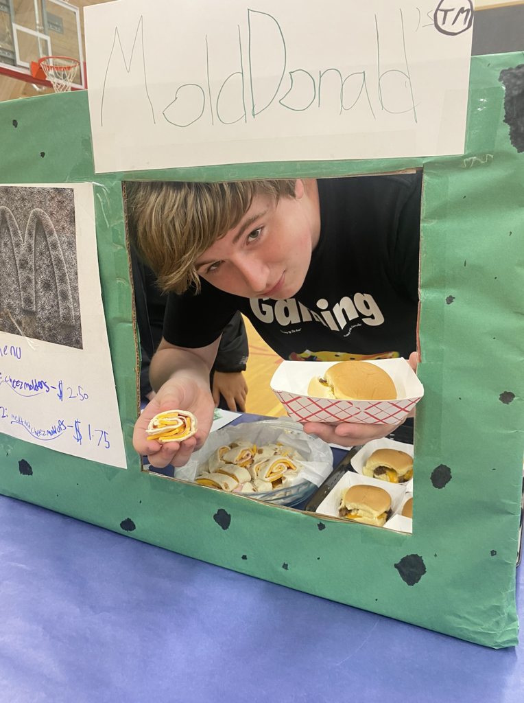 students with their food truck projects