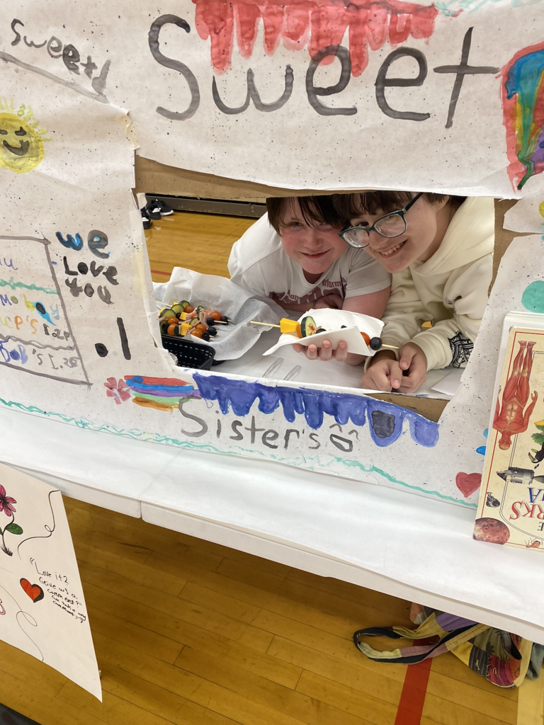 students with their food truck projects