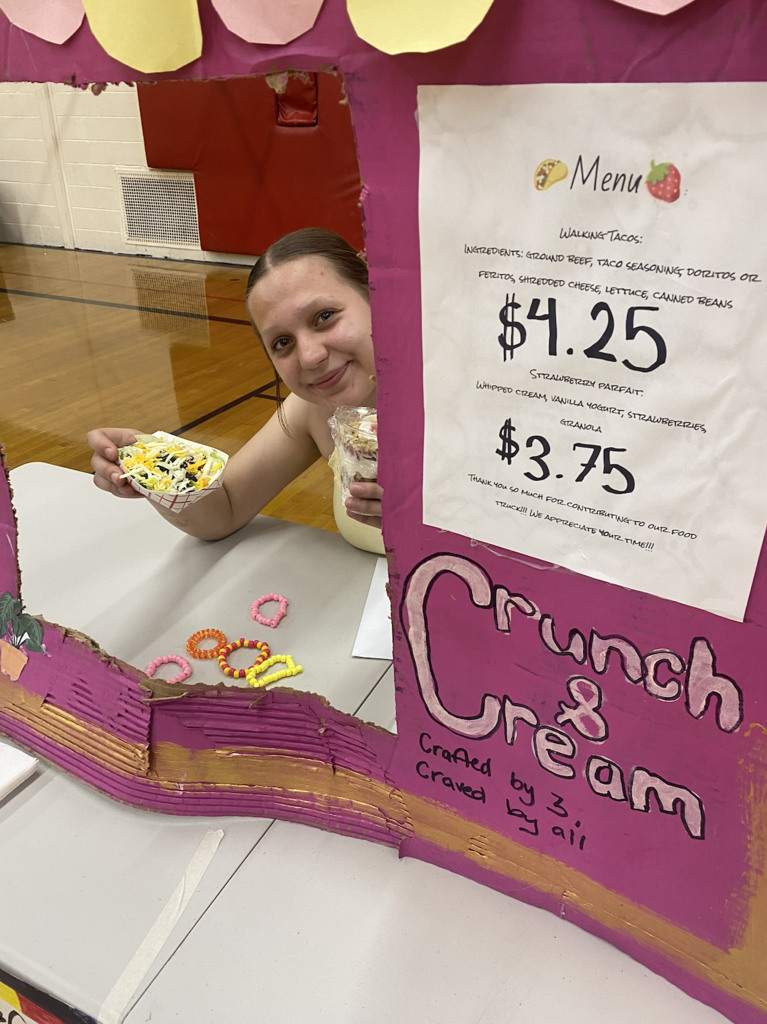 students with their food truck projects