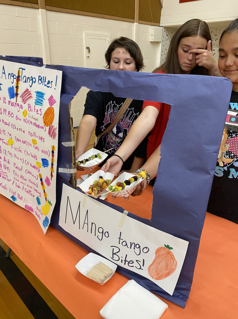 students with their food truck projects