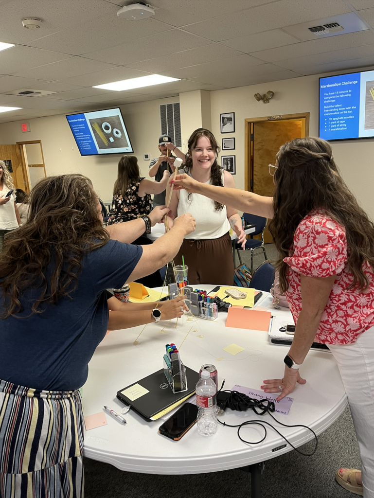 teachers working together at round tables