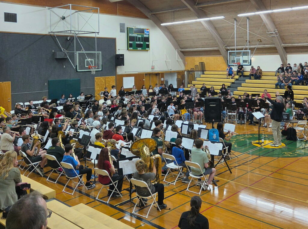 music students playing together in the gym