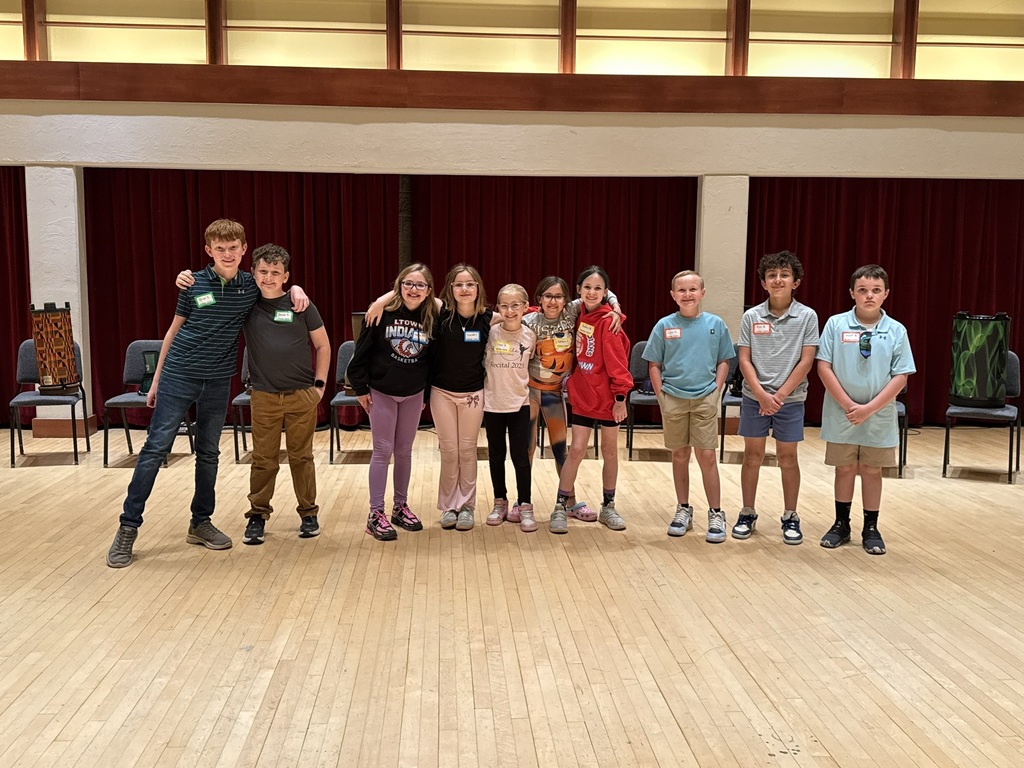 students on a stage