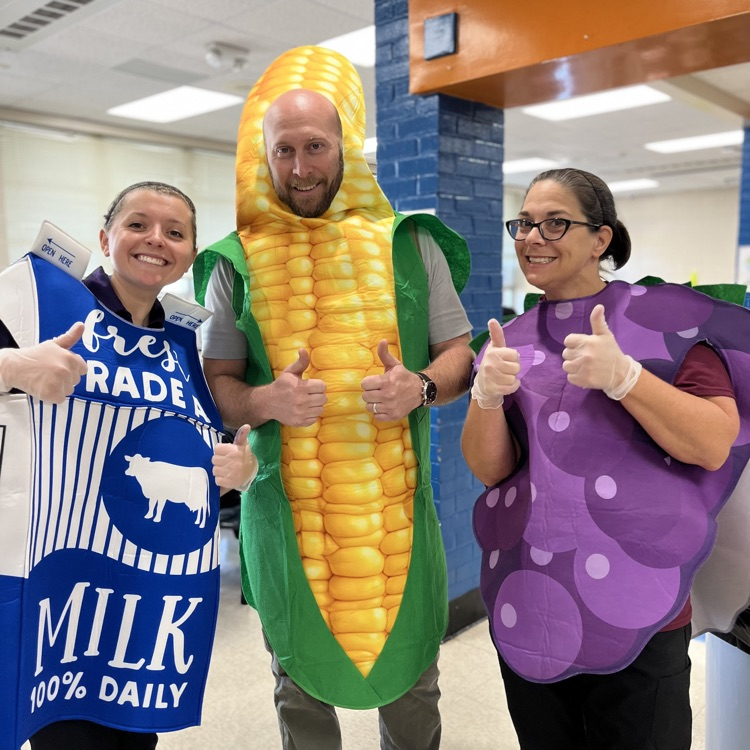 “Students and staff celebrating National School Lunch Week in the cafeteria.”