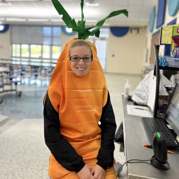 “Students and staff celebrating National School Lunch Week in the cafeteria.”