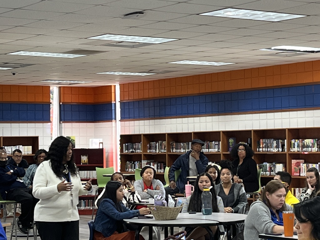 Dr. Nakia Hardy speaks to Lexington City Schools staff during the fall staff meeting at Lexington Senior High School.