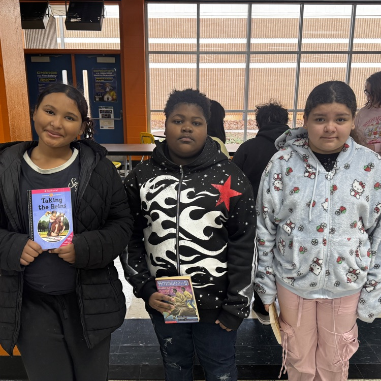Elementary students at Lexington City Schools receive books during a schoolwide distribution made possible through partnerships with Communities In Schools and the Rotary Club of Lexington.