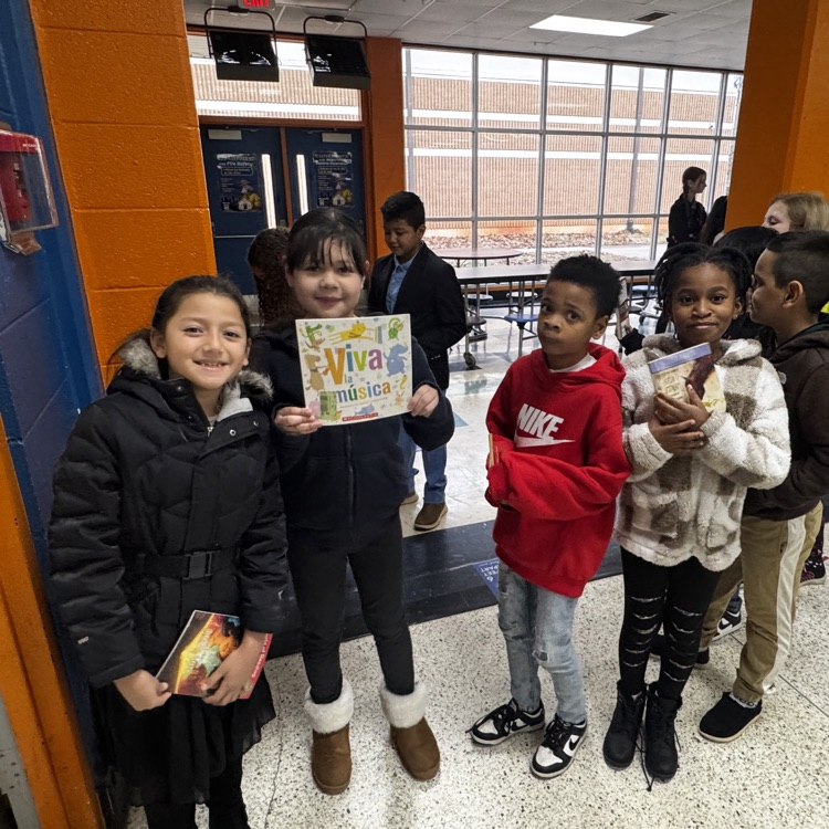 Elementary students at Lexington City Schools receive books during a schoolwide distribution made possible through partnerships with Communities In Schools and the Rotary Club of Lexington.