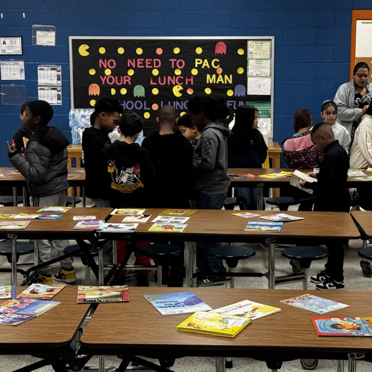 Elementary students at Lexington City Schools receive books during a schoolwide distribution made possible through partnerships with Communities In Schools and the Rotary Club of Lexington.