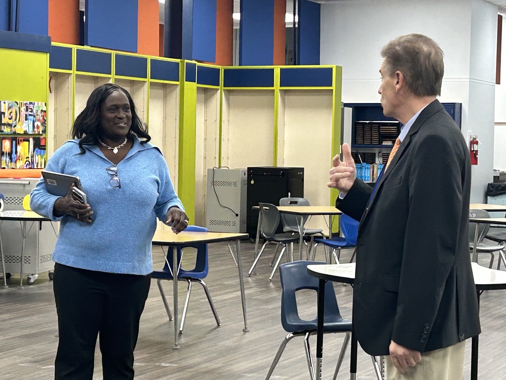 Dr. Rodney Shotwell greeting staff members and observing classroom activities during visits to Lexington City Schools.