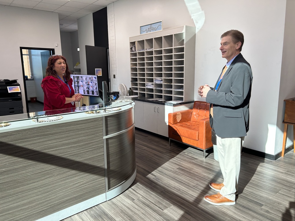 Dr. Rodney Shotwell greeting staff members and observing classroom activities during visits to Lexington City Schools.