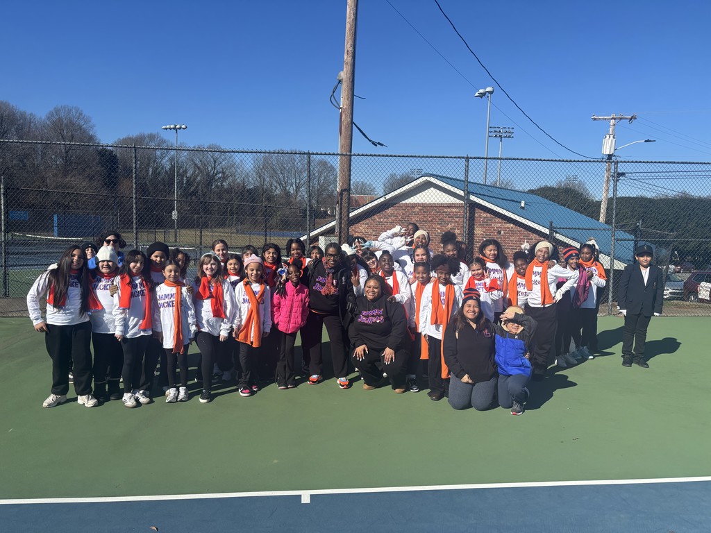 Students from Charles England Elementary School’s Jammin’ Jackets participate in the MLK Parade, marching together along the parade route as part of the community celebration.
