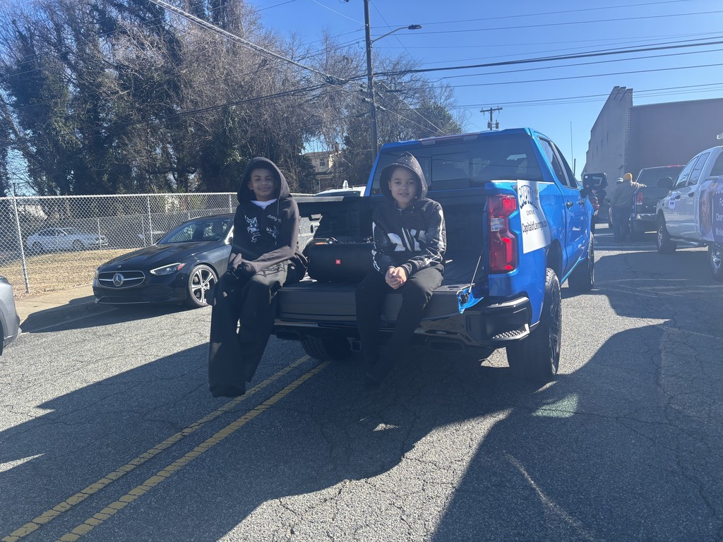 Students from Charles England Elementary School’s Jammin’ Jackets participate in the MLK Parade, marching together along the parade route as part of the community celebration.