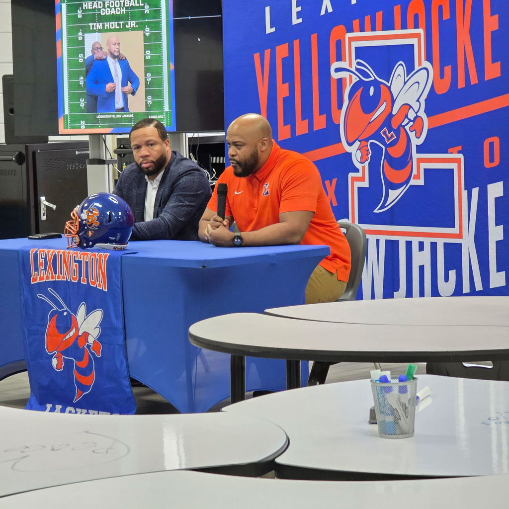 Dr. Porter and Coach TJ Holt Head Football Coach.