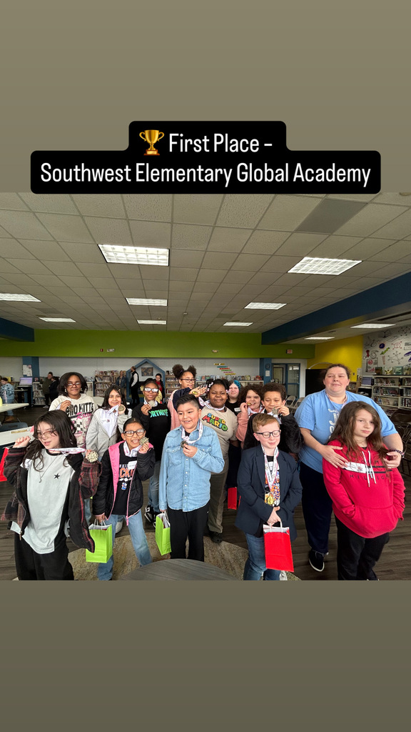 Elementary students from Southwest Elementary Global Academy pose with their team after earning first place in the Lexington City Schools Elementary Battle of the Books competition.