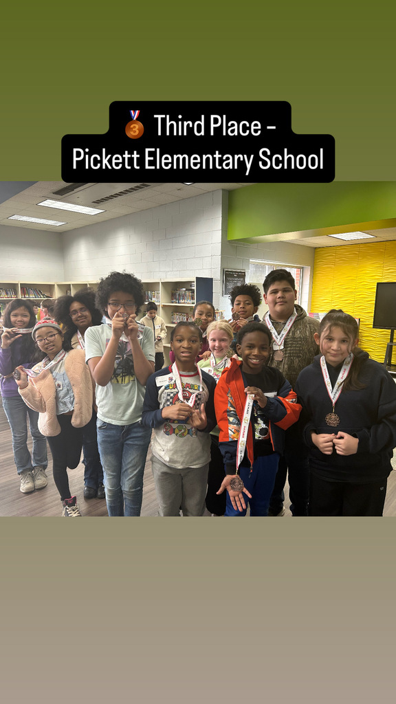 Students from Pickett Elementary School pose together after earning third place in the Lexington City Schools Elementary Battle of the Books competition.