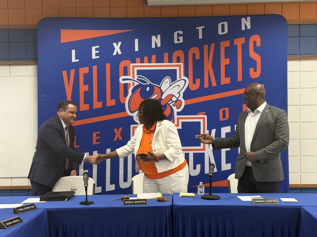 Photos from the April 21, 2026 Board meeting appointing Dr. Ron Anthony as Superintendent of Lexington City Schools, including Dr. Anthony, Board members, his family, and attendees.