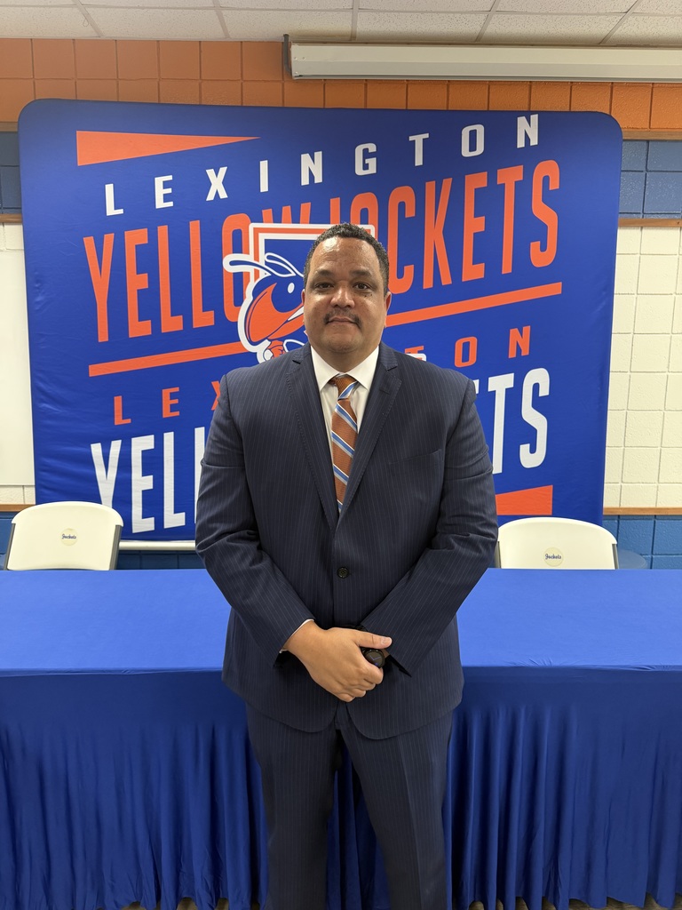 Photos from the April 21, 2026 Board meeting appointing Dr. Ron Anthony as Superintendent of Lexington City Schools, including Dr. Anthony, Board members, his family, and attendees.