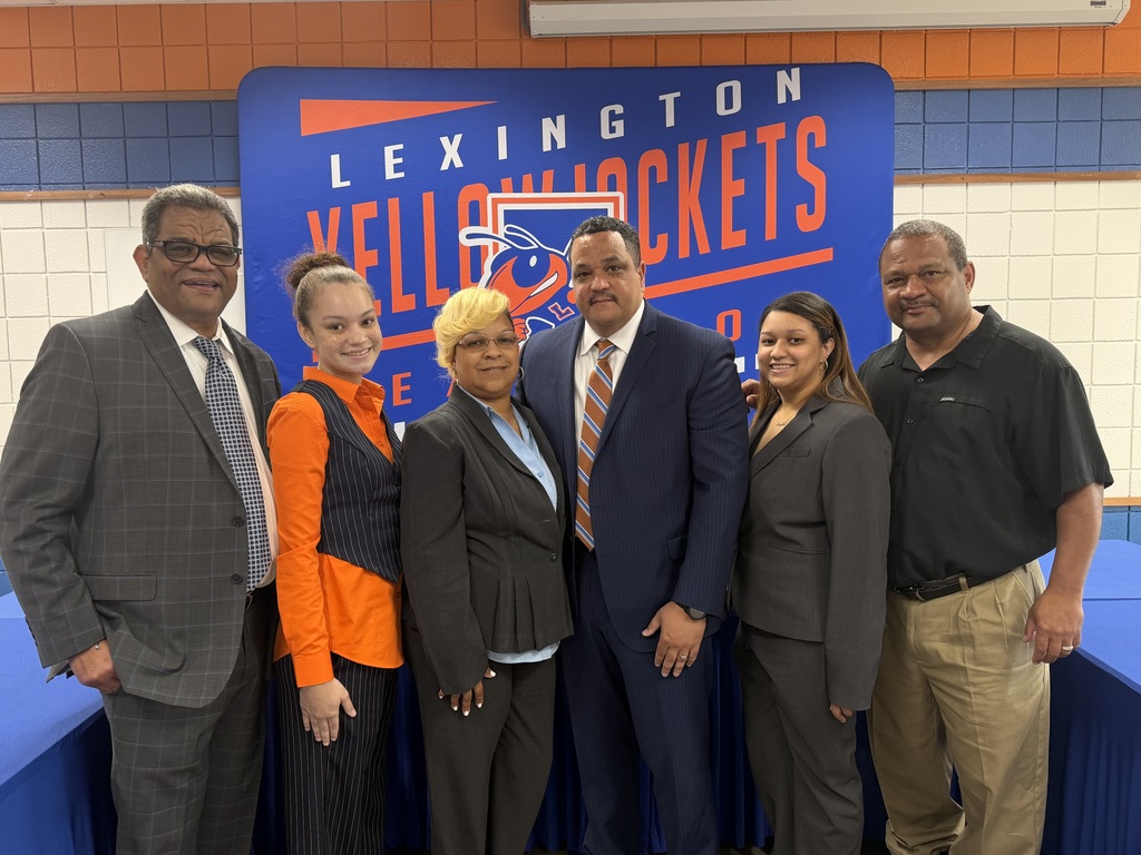 Photos from the April 21, 2026 Board meeting appointing Dr. Ron Anthony as Superintendent of Lexington City Schools, including Dr. Anthony, Board members, his family, and attendees.