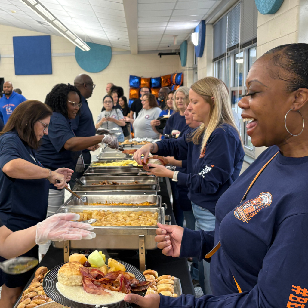 Members of the Lexington City Schools Board of Education support students and staff during back-to-school events.