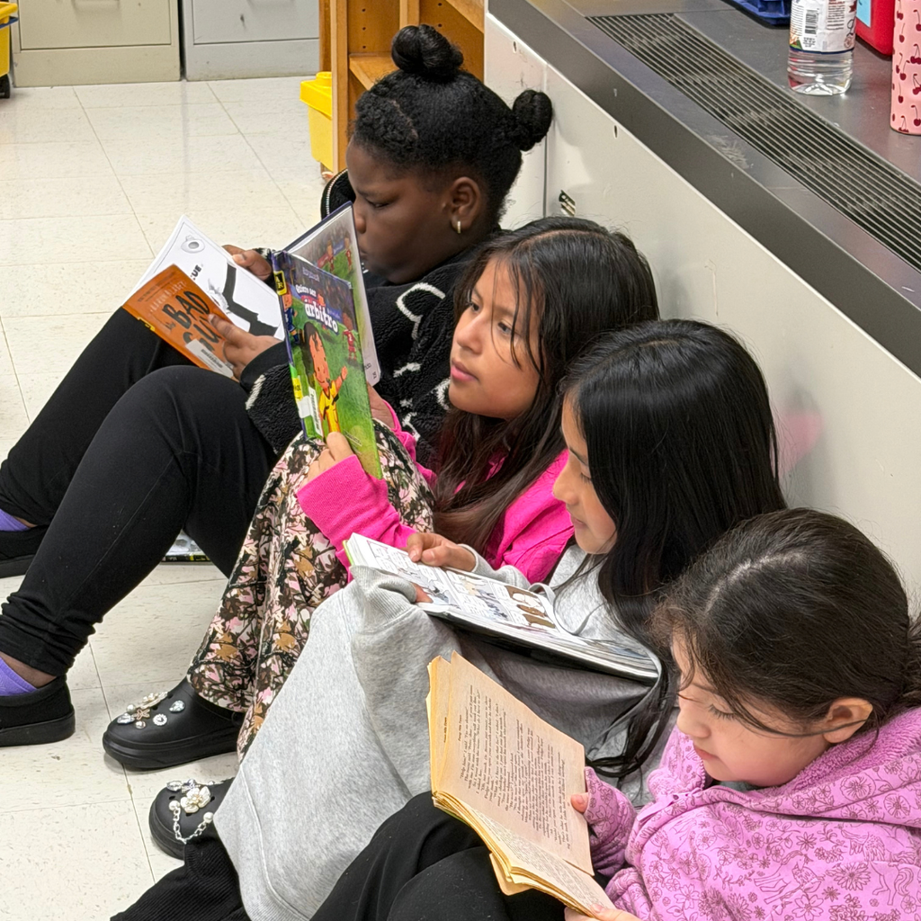 Pickett Elementary students and staff celebrate Dolly Parton’s Imagination Library Day of Reading with books, snacks and Dolly-inspired costumes.