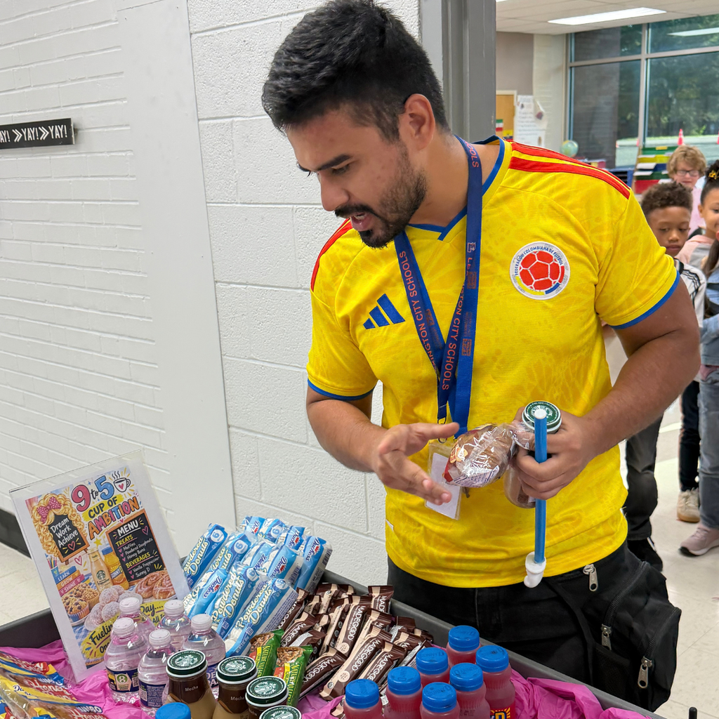 Pickett Elementary students and staff celebrate Dolly Parton’s Imagination Library Day of Reading with books, snacks and Dolly-inspired costumes.