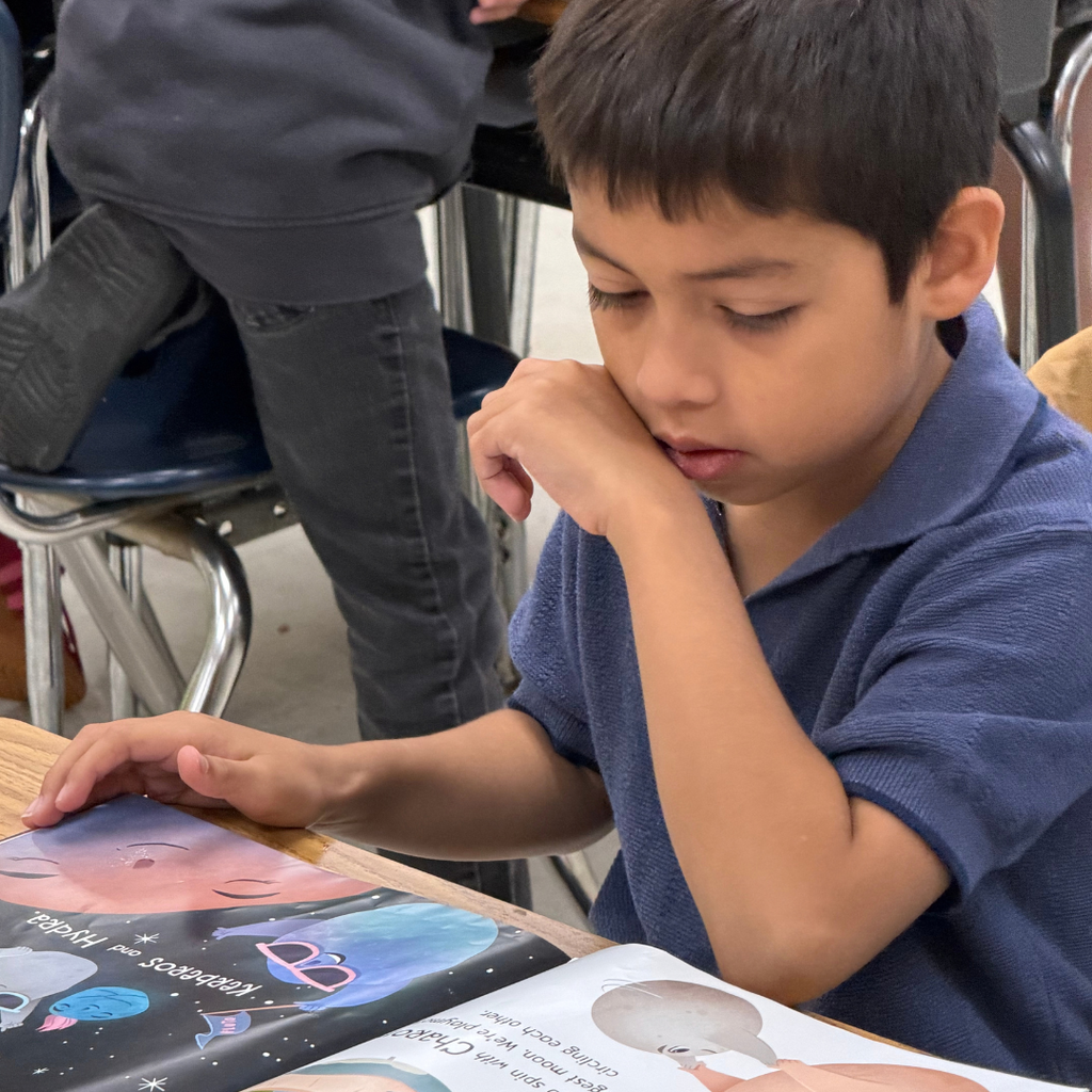 Pickett Elementary students and staff celebrate Dolly Parton’s Imagination Library Day of Reading with books, snacks and Dolly-inspired costumes.