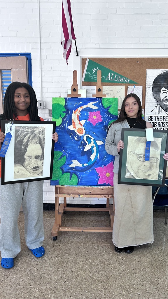 Several LSHS students and their artwork. These students won 1st place at the fair with their work. 