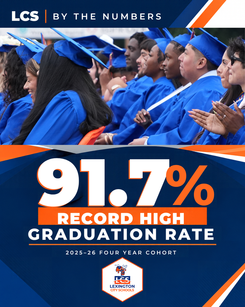 Alt text: LCS By the Numbers graphic highlighting Lexington Senior High School’s record 91.7% four year cohort graduation rate for 2025–26, featuring a photo of graduates celebrating in blue caps and gowns.