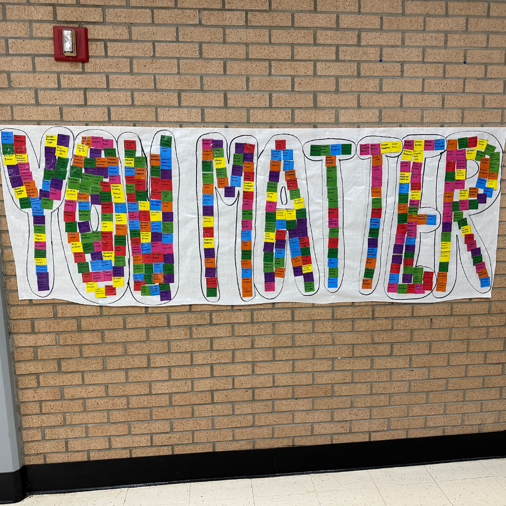 A large “YOU MATTER” display at Southwest Elementary Global Academy features colorful paper squares with students' names, emphasizing belonging and the importance of every student.
