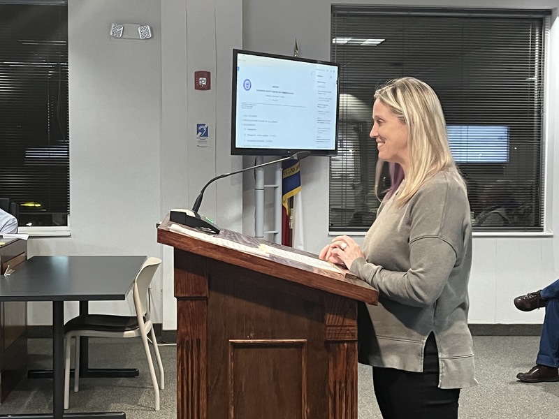 PES rep speaking during public comments at the County Commissioners Meeting.