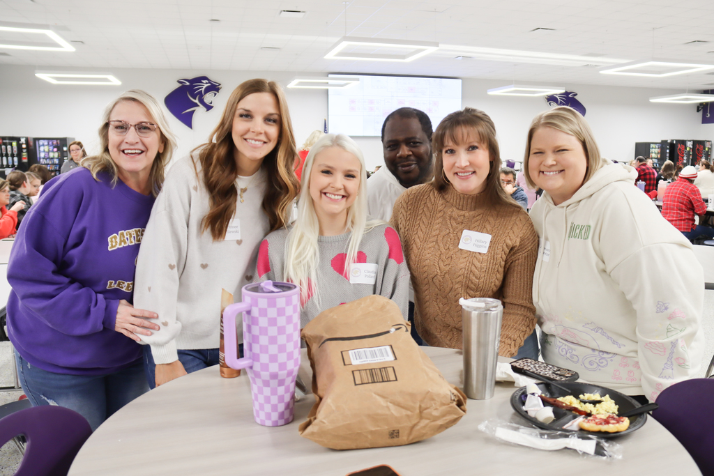 Love and leadership conference pic of smiling teachers
