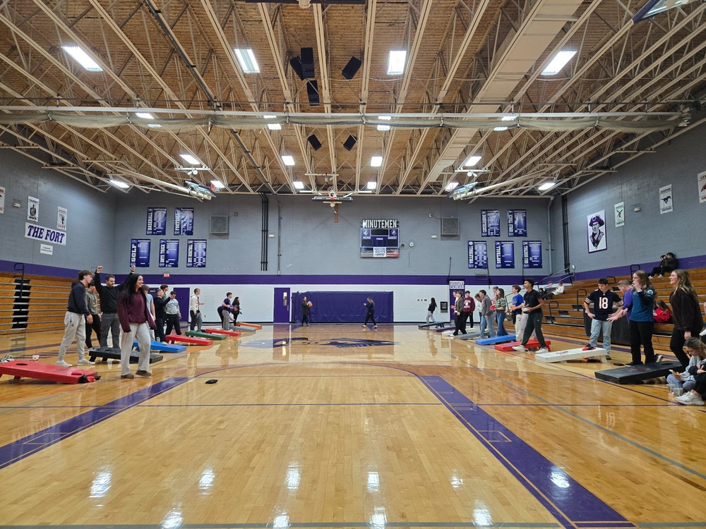 Students playing Bags