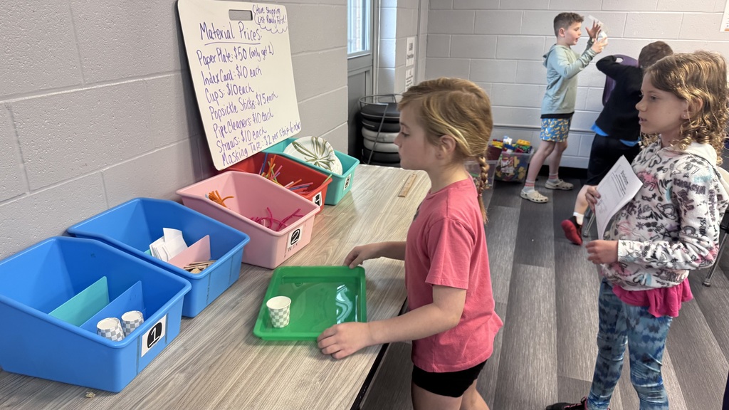 girls getting supplies