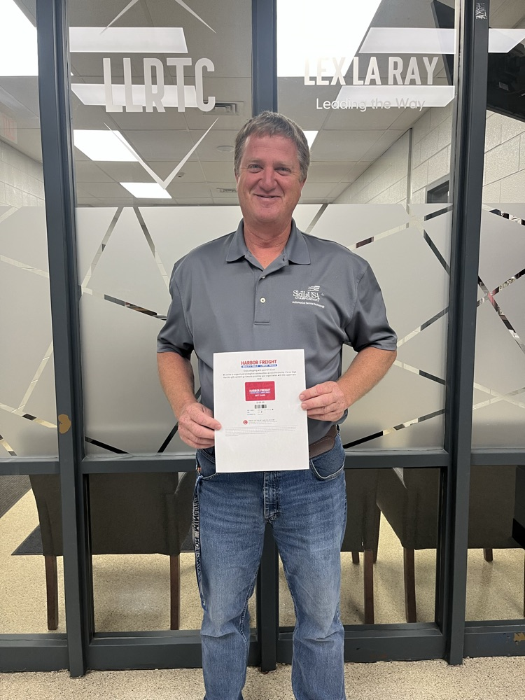 Mr. Wolken with his gift card