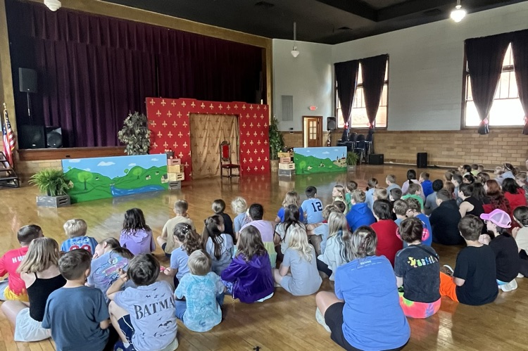 students waiting for performance