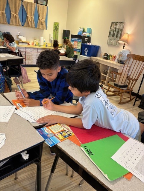 students editing one anothers work