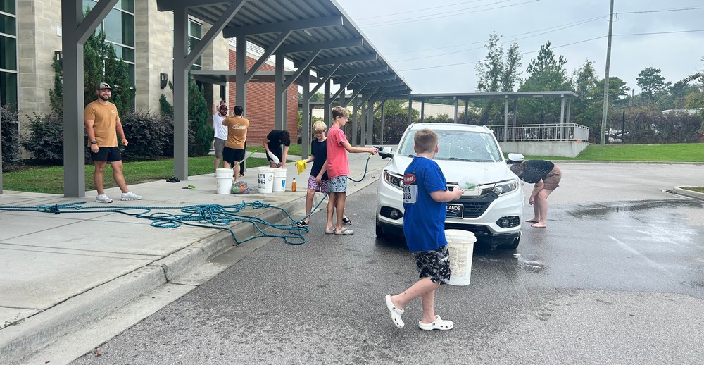 Junior Beta Club members participate in a recent car wash fundraiser at Fulmer.