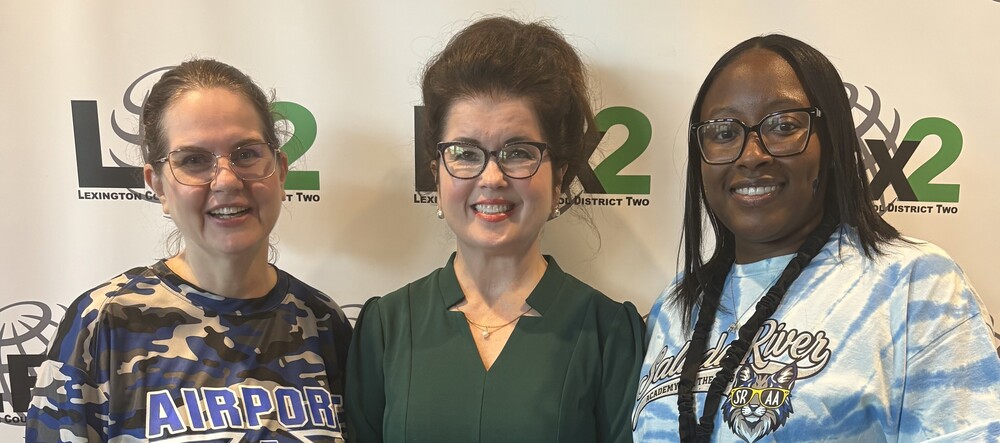 Standing together next to each other, from left: Evangeline  Reddick, Superintendent Dr. Angela Cooper, Brittany Morrison