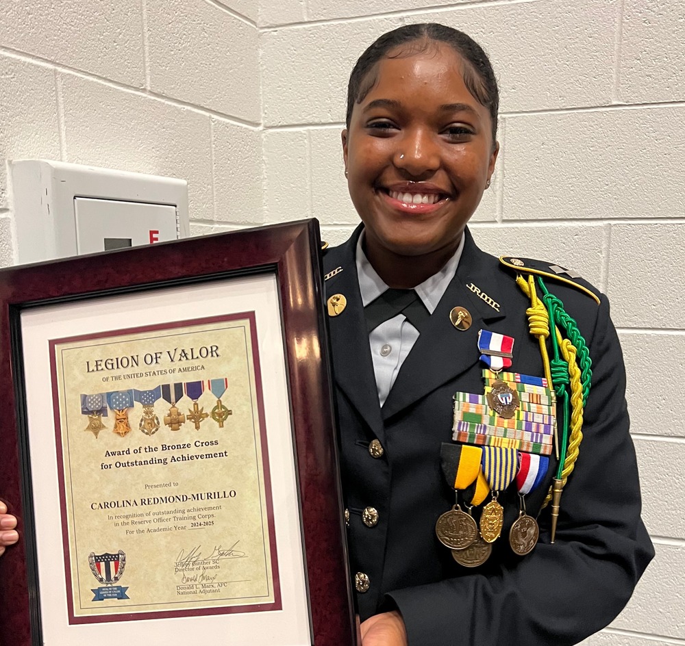Cadet Carolina Redmond-Murillo poses with her award