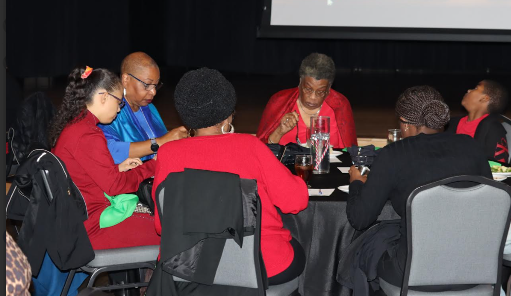 A table of guests enjoys dinner at the L2IC