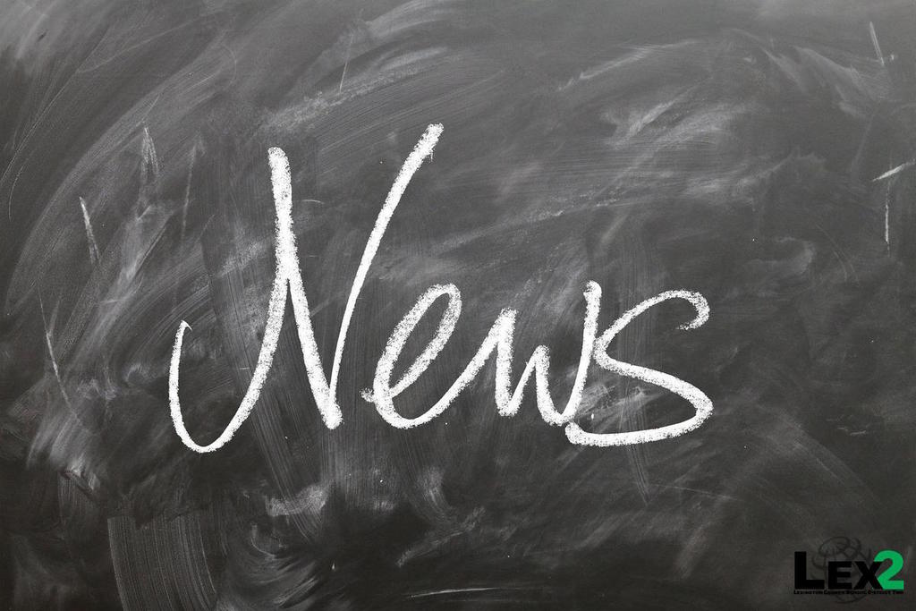 Photo of chalkboard with the word News written on it