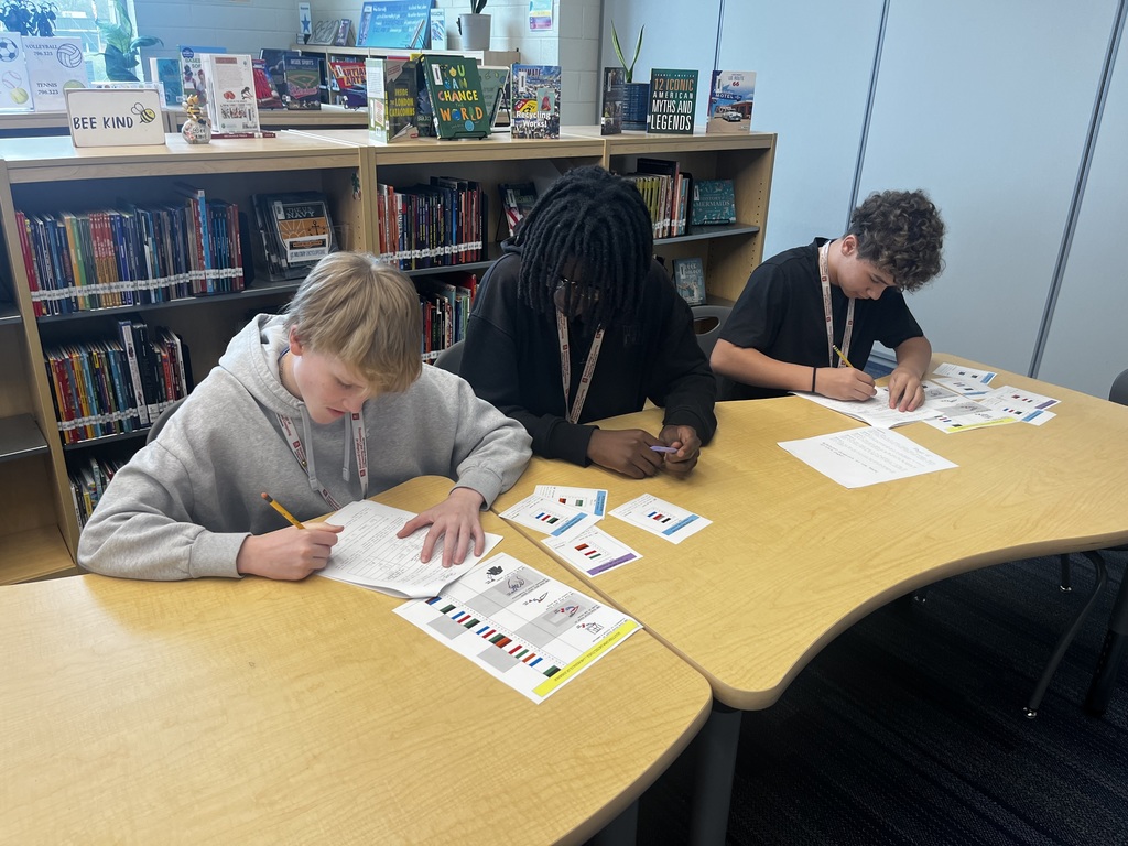 Fulmer Middle School students work through decoding lab results from a forensics lab using DNA evidence in a pretend scenario.