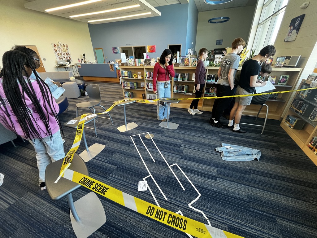 FMS students investigate a pretend crime scene by anallyzing the DNA samples and recording them on a documentation paper.