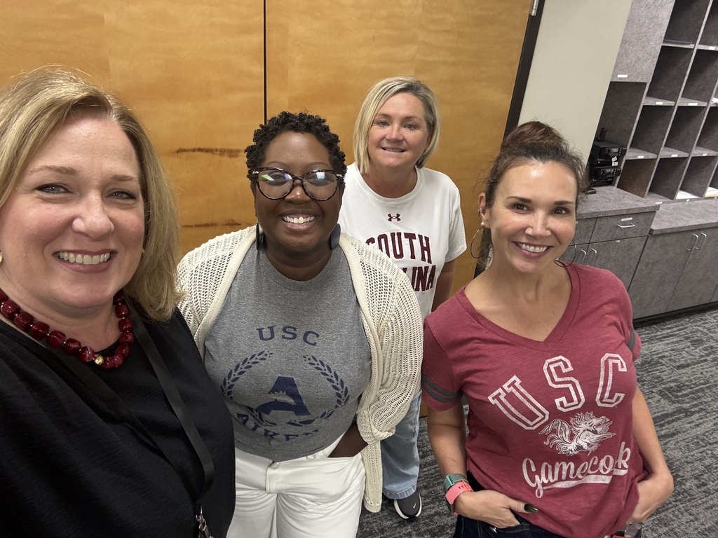 staff in college colors shirts