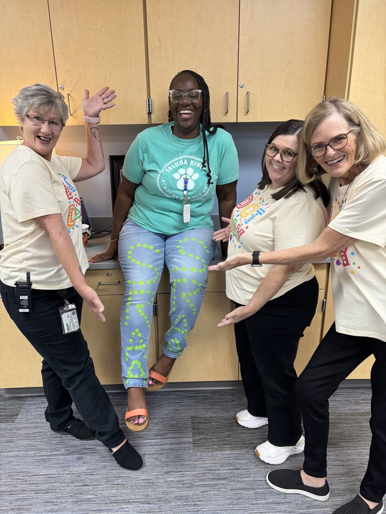 Staff wearing dots to show support for the arts