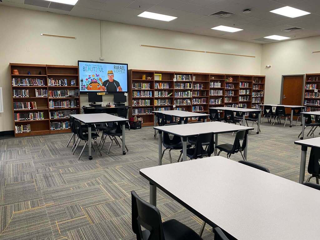 new tables and chairs in Pine Ridge library